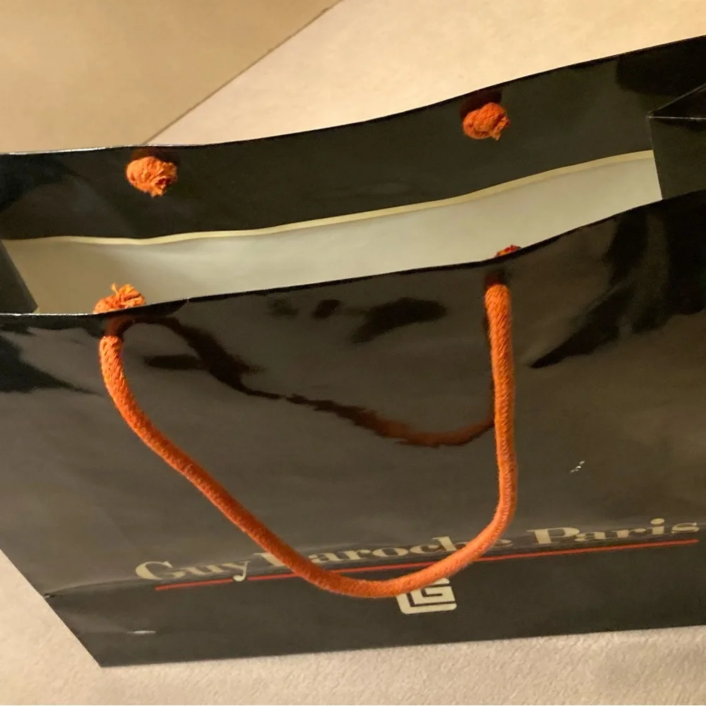 Guy Laroche Paris,black gloss glazed paper branded shopping tote,orange handles